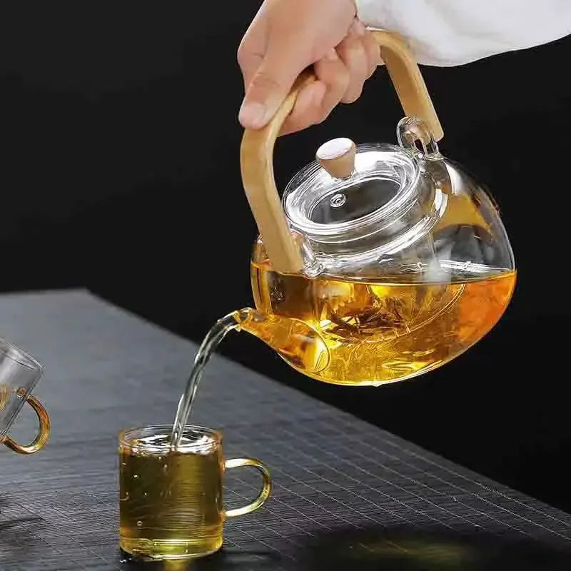Steaming Glass Teapot and Boiling Tea Kettle