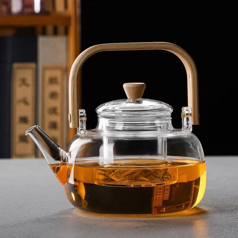 Steaming Glass Teapot and Boiling Tea Kettle