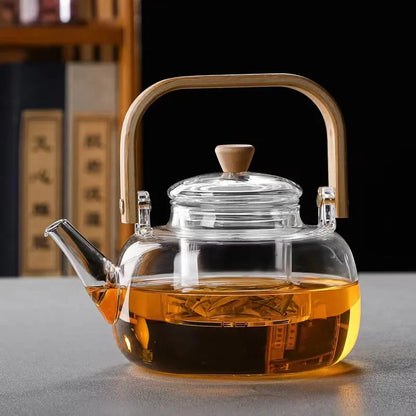 Steaming Glass Teapot and Boiling Tea Kettle