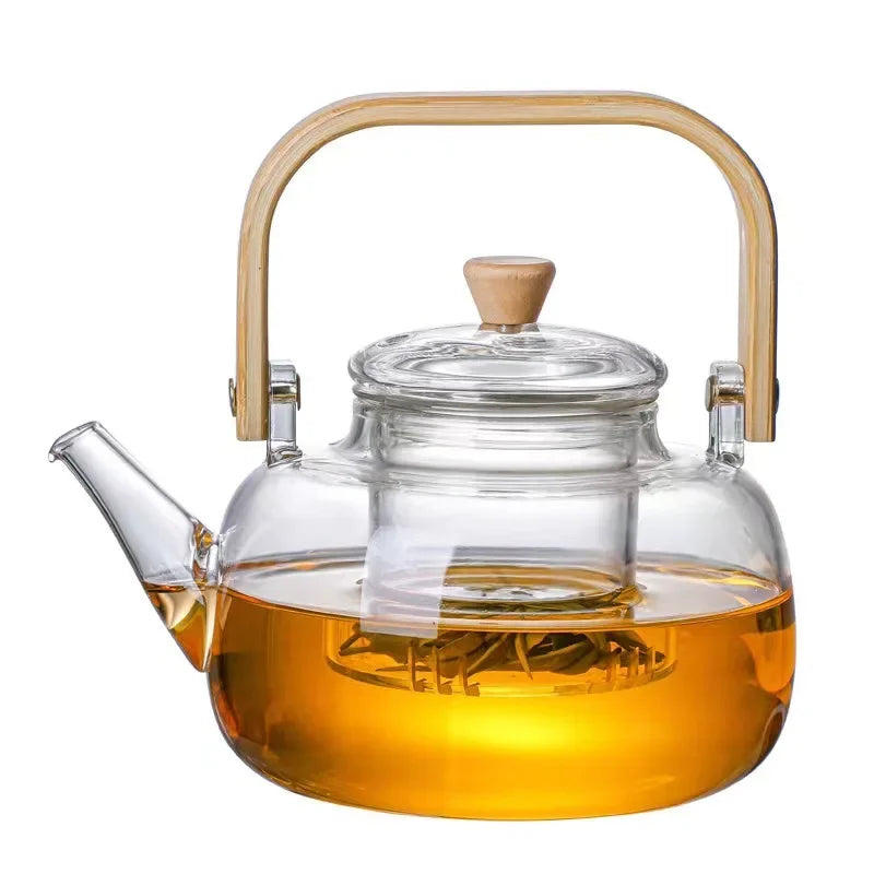 Steaming Glass Teapot and Boiling Tea Kettle