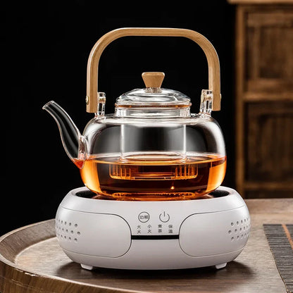 Steaming Glass Teapot and Boiling Tea Kettle